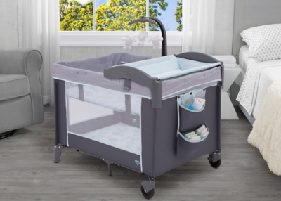 bassinet and changing table