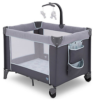 Keep your baby safe, close and comfy with the LX Deluxe Play Yard from Delta Children. You’ll love all the convenient features—a removable bassinet provides the ideal spot for naptime or bedtime while the removable changing table means you’ll always have a sturdy place to change diapers or dress your baby. A detachable storage compartment keeps changing necessities nearby, so you never have to run to another room for diapers or wipes. When your baby outgrows the bassinet, the insert is removable and this piece functions like a full-size play yard. Large mesh sides provide optimal ventilation while also permitting a clear view. Designed to use at home or away, the play yard’s wheels make it super-easy to move around the house, and the quick fold construction and included carry bag make for fuss-free travel. It’s everything you need for a nursery in a portable design.For any questions regarding delta children products, please contact consumersupport@deltachildren.com monday to friday, 8:30 a.m. To 6 p.m. (est) | Made of metal, plastic and fabric | Bassinet up to 15 lbs.; changing table up to 25 lbs.; play yard for children up to 35” tall | Removable, full-size bassinet is perfect for naptime or bedtime | Removable changing table station with waterproof surface | Snap-on hanging storage compartment for diapers, wipes and other toiletries | Removable mobile arm with hanging plush toys engages early visual development | Quick and compact fold; includes carrying bag for fuss-free travel or storage | Two wheels allow for easy movement from room to room | Easy to assemble; no tools required | Jpma certified to meet or exceed all safety standards set by the cpsc & astm