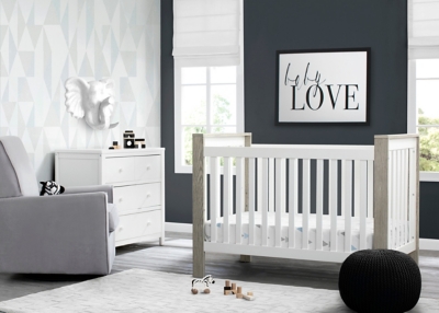 Delta crib with outlet drawer