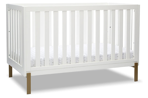 Shake things up in your nursery with the mixed material design of the Hendrix 4-in-1 Convertible Baby Crib by Delta Children. Pine wood construction conveys warmth while the shiny bronze legs add a modern, rock-and-roll flair. Designed to accommodate your growing child, this crib features a three-position adjustable mattress support. You can set the mattress at the highest height for your newborn baby then lower it as he or she begins to sit or stand. Thanks to an easy-to-use guardrail (sold separately), this crib isn’t just a bronzed beauty—it’s the only bed your little one will need. Transform it into a toddler bed when the time is right, and then to a stylish daybed when they’re ready for a little more independence. There’s even room underneath to fit a coordinating storage drawer (sold separately).For any questions regarding delta children products, please contact consumersupport@deltachildren.com monday to friday, 8:30 a.m. To 6 p.m. (est) | Made of wood and metal | Converts to a toddler bed (guardrail not included, sold separately), daybed and sofa | Pair this crib with any delta children pieces in matching colors to complete your baby's nursery | Adjustable height mattress support with 3 convenient positions to grow with your baby | Uses a standard size crib mattress (sold separately) | Assembly required