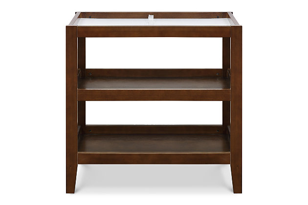 The Carter's Colby changing table features a universal design with clean lines that will suit any style of nursery decor. Crafted from non-toxic materials, its solid construction ensures baby can rest safely and comfortably during changings.Made of pine wood and engineered wood | 2 fixed shelves for open storage or to hold baskets | Meets ASTM international and U.S. CPSC safety standards | Includes 1" waterproof pad and anti-tip kit for added safety | Finished in non-toxic, multi-step painting process, lead and phthalate safe