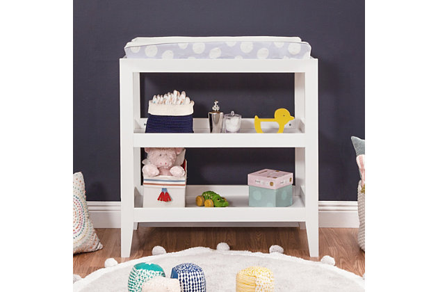The Carter's Colby changing table features a universal design with clean lines that will suit any style of nursery decor. Crafted from non-toxic materials, its solid construction ensures baby can rest safely and comfortably during changings.Made of pine wood and engineered wood | 2 fixed shelves for open storage or to hold baskets | Meets ASTM international and U.S. CPSC safety standards | Includes 1" waterproof pad and anti-tip kit for added safety | Finished in non-toxic, multi-step painting process, lead and phthalate safe