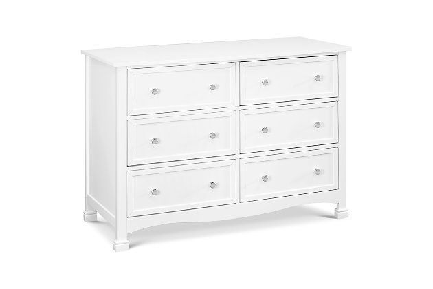 The Kalani 6-drawer dresser is the smart storage solution for the classic Kalani, Emily and Porter nursery collections. Six spacious drawers provide ample storage to organize all of baby’s necessities, while its thoughtful design ensures a style fit for any nursery or bedroom. Brilliant details of this double dresser include recessed front drawer panels, a gently curved apron front and curved top sides.Made of pine wood and TSCA-compliant engineered wood | Wooden drawer knobs | Metal drawer glides with stop mechanisms for added safety; anti-tip kit included | Meets ASTM international and U.S. CPSC safety standards | Finished in non-toxic, multi-step painting process, lead and phthalate safe
