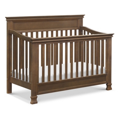crib with cushion headboard