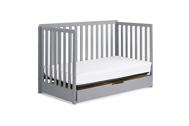 The Carter’s Colby crib with spacious trundle drawer combines clean lines and a spacious, built-in trundle for a beautiful and practical nursery. Converts to a toddler bed, daybed and full size bed for use long past the nursery years. Coordinates with the Colby 3-drawer and 6-drawer dressers for a beautifully equipped ensemble.Made of pine wood and engineered wood | Spacious trundle drawer allows for additional storage | Mattress platform offers four adjustable height options to accommodate your growing baby | GREENGUARD Gold Certified - screened for 360 VOCs and over 10,000 chemicals | Converts to toddler bed, daybed and full size bed (conversion kits sold separately) | Mattress sold separately | Assembly required