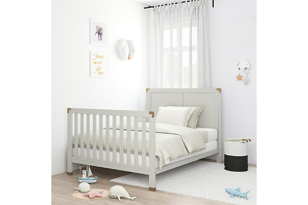 Create a space that is fun and sophisticated with the delightful Miles 5-in-1 convertible crib by Baby Relax. Combining campaign and modern style, this charismatic crib is crafted with a sturdy wood construction and features a panel headboard, vertical slats and simple post style legs. Sleek and safe, this crib comes equipped with four mattress positions that allow you to adjust the height of the platform as your child grows. When your child is ready, the Miles conveniently converts from a crib to a daybed, toddler bed and finally a size bed. From functionality also sprang great design with modern features such as clean lines, a fresh classic gray finish and aged brass-tone metal accents. Combine the Miles 5-in-1 convertible crib with the rest of the Baby Relax Miles collection to design a playy sophisticated nursery room that will grow with your child.Made of wood, engineered wood and metal | Campaign style 5-in-1 convertible crib | Features a modern non-toxic white finish | Includes antiqued brass-tone metal accents on the headboard and footboard | Easily converts into a toddler, daybed or size bed | Adjustable height mattress support with 4 convenient positions to grow with your baby | Uses a standard size crib mattress (sold separately) | Get the entire playy sophisticated look by combining the Miles 5-in-1 convertible crib with the rest of the Baby Relax Miles collection | JPMA certified and meets all CPSC and ASTM safety standards | 1-year limited warranty | For any questions regarding Dorel products, please contact customer service at 1-800-295-1980 | Assembly required