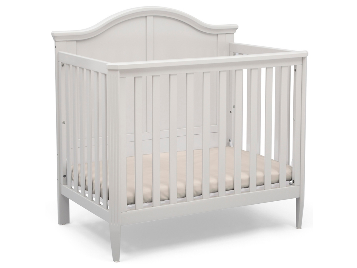 Delta children mini crib best sale