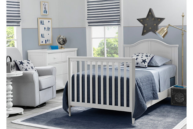 We know not every nursery has an abundance of space, that’s why we created the Delta Children Mini Convertible Baby Crib with Mattress and 2 Sheets set. A timeless silhouette with a bell-shaped headboard and fluted posts, this mini crib offers a classic look in the ideal size for smaller nurseries—without skimping on style, safety or comfort. Small but mighty, this baby crib features a two-position mattress support that can be lowered as your baby grows, plus it easily converts into a twin bed when your child is ready (conversion kit sold separately).Includes mini crib, mattress and 2 fitted crib sheets | Made of wood, engineered wood and metal | White finish | 2 fitted crib sheets (light gray, light beige) | Converts from crib to: twin bed with headboard or twin bed with headboard and footboard (bed frame and footboard each sold separately) | Adjustable height mattress support with 2 convenient positions to grow with your baby | Includes mini size crib mattress | Assembly required | Delta children cribs are jpma certified, and are tested above and beyond industry standards | For any questions regarding delta children products, please contact consumersupport@deltachildren.com monday to friday, 8:30 a.m. To 6 p.m. (est)
