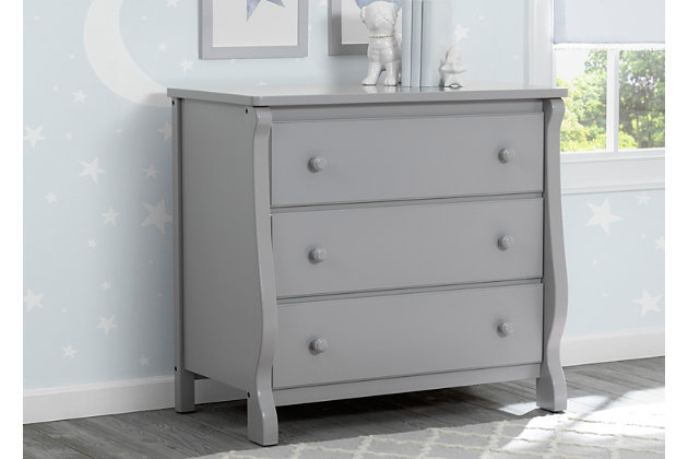 The curved lines and versatile functionality of the Universal 3 Drawer Dresser from Delta Children will give your baby's nursery a beautiful, timeless look. Favorite details include a gender-neutral design for boys or girls bedrooms, safety stops that prevent the drawers from falling out, and large wooden knobs to make opening and closing the drawers easy. With three spacious drawers, there's room to store all their essentials. More importantly, this youth dresser is built from made-to-last materials to ensure years of use.Dresser only | Made of pine wood, engineered wood and metal | Gray finish | 3 smooth-operating drawers with safety stops | Anti tip-over kit included | Delta children dressers meet the requirements of astm f2057, the voluntary industry tip over standard for dressers | For any questions regarding delta children products, please contact consumersupport@deltachildren.com monday to friday, 8:30 a.m. To 6 p.m. (est) | Easy assembly