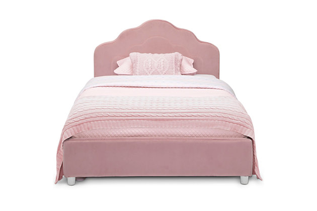 Inspire sweet dreams with this Upholstered Twin Bed by Delta Children. Perfect for your little one’s bedroom, this twin bed shows off velvety pink upholstery with a playful scalloped silhouette for a look both you and your child will love. Generous padding ensures long-lasting comfort and support while sitting up to read or watch TV. The bed’s durable wood platform frame with slats eliminates the need for a box spring. Twin Mattress sold separately.Upholstered twin bed set | Made of pine wood, engineered wood and metal | Pink polyester velvet upholstery; foam padded headboard | Holds up to 350 pounds | Fits standard twin mattress (sold separately) | Bed does not require a foundation/box spring | Built low to the ground to help your little one get in and out of bed | Easy-to-clean | Meets or exceeds all cpsia requirements | Easy assembly | For any questions regarding delta children products, please contact consumersupport@deltachildren.com monday to friday, 8:30 a.m. To 6 p.m. (est)
