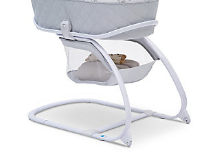 The Deluxe Moses Bassinet from Delta Children is a comfortable sleep space for newborns that combines a Moses basket with a standard bassinet. The adorable Moses basket safely attaches to the bassinet frame, and can be easily removed, so you can keep your baby nearby as you move around the house. To calm your newborn, the attached electronic pod plays peaceful music or emits gentle vibrations while two plush hanging toys attached to the canopy stimulate Baby’s visual senses. A soft nightlight will help you check in on your little one without disturbing them, and an easy-to-reach storage basket keeps blankets, diapers or other supplies nearby. The bassinet’s adjustable canopy offers light-bloc protection for daytime naps. A great first sleep space for your baby, the Deluxe Moses Bassinet from Delta Children is a versatile option that works in your bedroom, the living room, the kitchen, or wherever you may go.Made of plastic, metal and fabric | 2-in-1 design allows use with or without bassinet stand | Includes 1" water-resistant pad and machine washable mattress cover | Electronic pod emits lights, sounds and vibrations; requires 3 aa batteries (not included) | Adjustable canopy with 2 plush hanging toys | Easy-roll wheels for mobility | Storage underneath | Easy assembly (no tools required) | Recommended for ages 0-5 months; holds up to 15 pounds | Jpma certified to meet or exceed all safety standards set by the cpsc & astm | For any questions regarding delta children products, please contact consumersupport@deltachildren.com monday to friday, 8:30 a.m. To 6 p.m. (est)