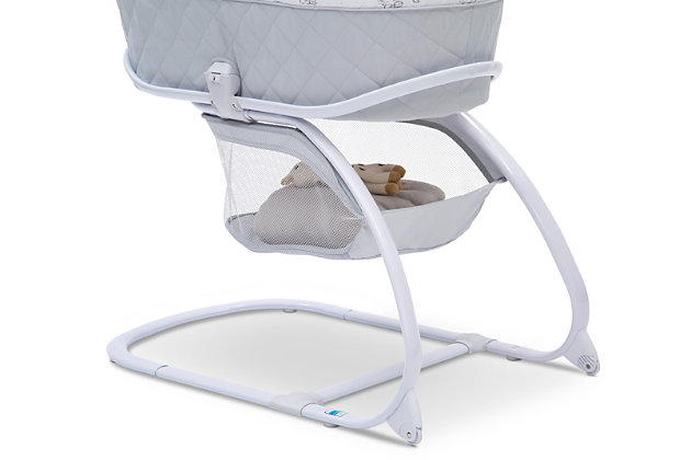 The Deluxe Moses Bassinet from Delta Children is a comfortable sleep space for newborns that combines a Moses basket with a standard bassinet. The adorable Moses basket safely attaches to the bassinet frame, and can be easily removed, so you can keep your baby nearby as you move around the house. To calm your newborn, the attached electronic pod plays peaceful music or emits gentle vibrations while two plush hanging toys attached to the canopy stimulate Baby’s visual senses. A soft nightlight will help you check in on your little one without disturbing them, and an easy-to-reach storage basket keeps blankets, diapers or other supplies nearby. The bassinet’s adjustable canopy offers light-bloc protection for daytime naps. A great first sleep space for your baby, the Deluxe Moses Bassinet from Delta Children is a versatile option that works in your bedroom, the living room, the kitchen, or wherever you may go.Made of plastic, metal and fabric | 2-in-1 design allows use with or without bassinet stand | Includes 1" water-resistant pad and machine washable mattress cover | Electronic pod emits lights, sounds and vibrations; requires 3 aa batteries (not included) | Adjustable canopy with 2 plush hanging toys | Easy-roll wheels for mobility | Storage underneath | Easy assembly (no tools required) | Recommended for ages 0-5 months; holds up to 15 pounds | Jpma certified to meet or exceed all safety standards set by the cpsc & astm | For any questions regarding delta children products, please contact consumersupport@deltachildren.com monday to friday, 8:30 a.m. To 6 p.m. (est)