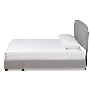 Sweet dreams abound with this bed. Upholstered in an elegant linen-like fabric that provides ample comfort for you to lean against as you read or watch TV. The headboard features a scooped silhouette highlighted by glamourous silvertone studs, giving the piece an air of modern luxury. Stylish and practical, the footboard is fitted with two drawers with space to store clothes, sheets and more.Made of wood, engineered veneer and engineered wood | Polyester faux linen upholstery with silvertone nailhead accents | 2 storage drawers in footboard | Foundation/box spring required; sold separately | Assembly required