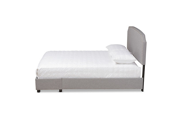 Sweet dreams abound with this bed. Upholstered in an elegant linen-like fabric that provides ample comfort for you to lean against as you read or watch TV. The headboard features a scooped silhouette highlighted by glamourous silvertone studs, giving the piece an air of modern luxury. Stylish and practical, the footboard is fitted with two drawers with space to store clothes, sheets and more.Made of wood, engineered veneer and engineered wood | Polyester faux linen upholstery with silvertone nailhead accents | 2 storage drawers in footboard | Foundation/box spring required; sold separately | Assembly required