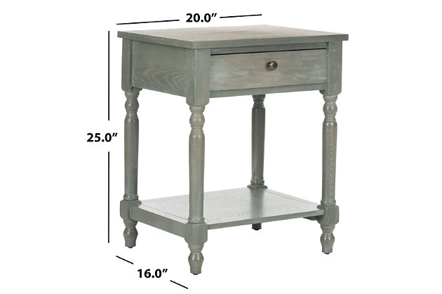 Brimming with vintage style, this nightstand will complement every setting from coastal cottage to prairie farmhouse. With turned spindle legs, handy shelf and storage drawer, this is beautifully crafted for a look that's fashion-right yet superbly timeless.Made of poplar wood and zinc | French gray lacquer finish | Single drawer | Zinc alloy hardware | Fixed lower shelf | Assembly required