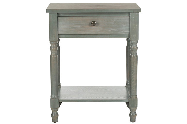 Brimming with vintage style, this nightstand will complement every setting from coastal cottage to prairie farmhouse. With turned spindle legs, handy shelf and storage drawer, this is beautifully crafted for a look that's fashion-right yet superbly timeless.Made of poplar wood and zinc | French gray lacquer finish | Single drawer | Zinc alloy hardware | Fixed lower shelf | Assembly required