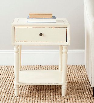 Add a touch of vintage charm with this end table. Bringing just the right amount of storage and country style to the bedroom, living room or even a home office with its clean lines and refined sculptured legs, this table is a pleasant addition to your farmhouse or country cottage aesthetic.Made of poplar wood and zinc | Vanilla lacquer finish | Single drawer | Zinc alloy hardware | Fixed lower shelf | Assembly required