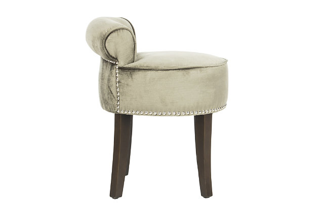 This delightful, round vanity chair is pretty and petite enough to tuck in a bathroom or bedroom and brimming with feminine style. Graceful wood legs, deep seat, sophisticated colored fabric and diminutive button tufted back are designed for indulgent comfort. This vanity stool is a charming seat suited for various types of decor.Viscose/cotton upholstery | High-resiliency foam cushions wrapped in thick poly fiber | Birch wood legs with espresso finish | Brass-tone nailhead trim | Assembly required