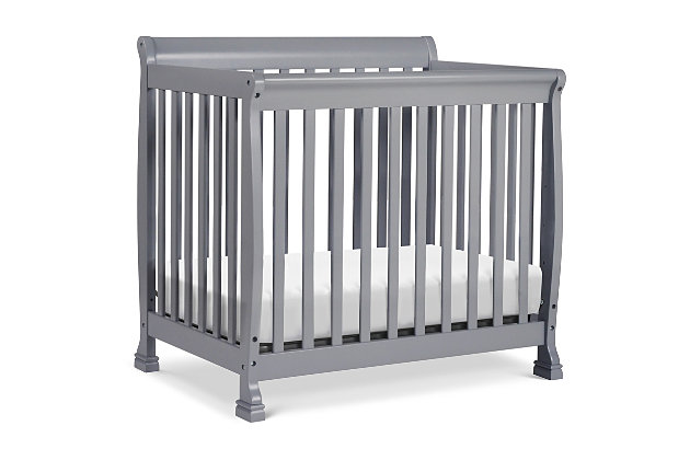 The Kalani Mini Crib is elegance, durability and reliability. Mirroring the Kalani 4-in-1 Crib's timeless design, the Kalani Mini Crib features soft, subtle curves and the same lifetime functionality. Four mattress levels allow you to adjust the mattress height to your child's growth. Beyond the nursery years, the Kalani Mini Crib conveniently becomes a beautiful mini toddler bed, daybed, and twin-size bed (conversion kits sold separately).GREENGUARD GOLD CERTIFIED: This product has been tested for over 10,000 chemical emissions and VOCs, undergoing rigorous scientific testing to meet some of the world's most stringent chemical emissions requirements. It contributes to cleaner indoor air, creating a healthier environment for your baby to sleep, play, and grow. | 4-in-1 CONVERTIBILITY: Designed to save you the hassle (and extra money!) of buying multiple beds as your little one grows. It easily converts to a mini toddler bed, daybed, and twin-size bed (mini toddler kit #M20399 and twin-size kit #M4799 sold separately). | GROWS WITH BABY: 4 adjustable mattress positions that you can lower as your baby begins to sit and stand. We've built this crib to withstand even the most active babies and toddlers and last through your child's teen years | SPACE EFFICIENT: A mini crib is a great alternative for smaller spaces (such as parents' bedroom & smaller apartments) or to store at grandparents' house to make traveling back and forth easy for the whole family | BASSINET ALTERNATIVE: The American Pediatric Association recommends co-sleeping for the first 6 months. A mini crib is a more stylish alternative to a pack-n-play and a more long-term solution than a bassinet for keeping your baby closeby as you sleep. | QUALITY MATERIAL: Made of solid sustainable New Zealand pinewood and TSCA compliant engineered wood -only the best for your baby | FOR YOUR BABY'S SAFETY: Say goodbye to toxic chemicals! Finished in a non-toxic multi-step painting process and lead and phthalate safe. Rest assured knowing it exceeds ASTM International and U.S. CPSC safety standards. | MATTRESS COMPATIBILITY: Includes 1" waterproof pad. While this crib fits any standard size mini crib mattress, it best fits with DaVinci’s line of firm comfort, GREENGUARD gold, waterproof mini mattresses. | COMPLETE THE LOOK: Shop Kalani 3-Drawer Dresser & 6-Drawer Dresser for a coordinated nursery