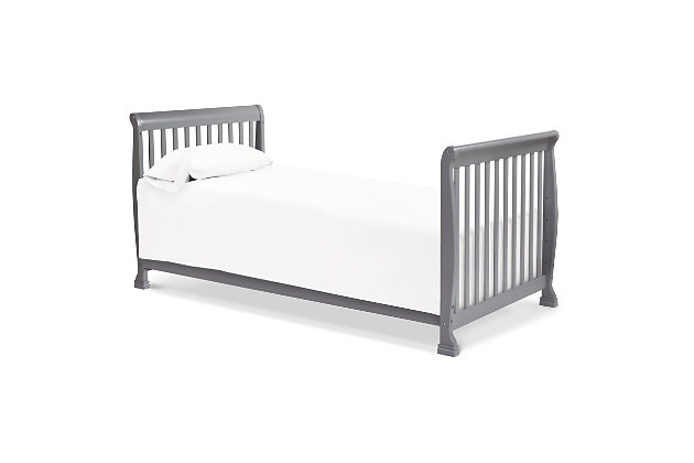 The Kalani Mini Crib is elegance, durability and reliability. Mirroring the Kalani 4-in-1 Crib's timeless design, the Kalani Mini Crib features soft, subtle curves and the same lifetime functionality. Four mattress levels allow you to adjust the mattress height to your child's growth. Beyond the nursery years, the Kalani Mini Crib conveniently becomes a beautiful mini toddler bed, daybed, and -size bed (conversion kits sold separately).GREENGUARD GOLD CERTIFIED: This product has been tested for over 10,000 chemical emissions and VOCs, undergoing rigorous scientific testing to meet some of the world's most stringent chemical emissions requirements. It contributes to cleaner indoor air, creating a healthier environment for your baby to sleep, play, and grow. | 4-in-1 CONVERTIBILITY: Designed to save you the hassle (and extra money!) of buying multiple beds as your little one grows. It easily converts to a mini toddler bed, daybed, and -size bed (mini toddler kit #M20399 and -size kit #M4799 sold separately). | GROWS WITH BABY: 4 adjustable mattress positions that you can lower as your baby begins to sit and stand. We've built this crib to withstand even the most active babies and toddlers and last through your child's teen years | SPACE EFFICIENT: A mini crib is a great alternative for er spaces (such as parents' bedroom & er apartments) or to store at grandparents' house to make traveling back and forth easy for the whole family | BASSINET ALTERNATIVE: The American Pediatric Association recommends co-sleeping for the first 6 months. A mini crib is a more stylish alternative to a pack-n-play and a more long-term solution than a bassinet for keeping your baby closeby as you sleep. | QUALITY MATERIAL: Made of solid sustainable New Zealand pinewood and TSCA compliant engineered wood -only the best for your baby | FOR YOUR BABY'S SAFETY: Say goodbye to toxic chemicals! Finished in a non-toxic multi-step painting process and lead and phthalate safe. Rest assured knowing it exceeds ASTM International and U.S. CPSC safety standards. | MATTRESS COMPATIBILITY: Includes 1" waterproof pad. While this crib fits any standard size mini crib mattress, it best fits with DaVinci’s line of firm comfort, GREENGUARD gold, waterproof mini mattresses. | COMPLETE THE LOOK: Shop Kalani 3-Drawer Dresser & 6-Drawer Dresser for a coordinated nursery