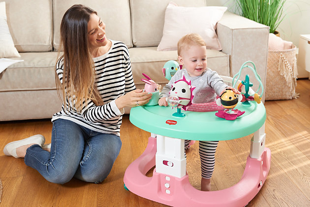 A world of wonder awaits in the Tiny Love 4-in-1 Here I Grow Activity Center.

This 4-in-1 mobile activity center encourages baby's development, with fun and engaging activities that inspire them to learn and grow.

The adorable Tiny Pioneers are here to help them on their journey. These lovable friends encourage baby to explore and discover a new world around them, with the help of stimulating features, fascinating textures and vibrant colors.

The Here I Grow can be used in multiple modes—as a stationary activity center, push along, jumper, or walker to get babies moving around independently through each developmental stage.

A 360 degree rotating seat allows baby to fully explore their surroundings and be part of the action. Plus, baby will always be entertained with 6 developmental toys and more than 28 activities.

The 4-in-1 Here I Grow Activity Center unlocks baby’s imagination and inspires a journey of growth and discovery. 
For children who can sit up unassisted up to children no more than 30 lbs. or 32 inches.PROMOTES CHILD DEVELOPMENT – Whether used as a stationary activity center, push along, jumper or walker, each activity grows with your child to match their developmental milestones. | 4-IN-1 AND DONE – It’s the only entertainer you’ll ever need. Safely lock the wheels and baby can play stationary and swivel around. Or, they can push it, practice walking, or bounce and giggle. | EXPLORE THE SEVEN DEVELOPMENTAL WONDERS – Over 20 different activities invite baby to discover the Seven Developmental Wonders™: cognition, language, fine motor skills, senses, gross motor skills, creativity, and emotional intelligence. | EASY TO CLEAN – Take care of those unavoidable messes by removing the seat pad and tossing it in the washing machine.