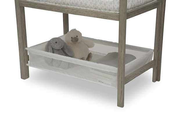 The Farmhouse 2-in-1 Wood Bedside Bassinet Sleeper and Changer by Simmons Kids is the ultimate multitasker. A great option for smaller nurseries, your master bedroom or the grandparents’ house, it features a solid wood frame and legs with a hand-applied textured finish. Its convertible design can be used as a bedside bassinet and then a changing table (simply by adding the provided changing top). The mesh sides allow generous airflow, while the adjustable/removable canopy helps diffuse light to create a dimmer sleeping environment during the day. Its lightweight design makes it easy to move from room to room. Pair it with other items from the Delta Children Farmhouse Collection for the perfect rustic-inspired nursery.Made of sustainable pine wood, fabric and metal | Hand-applied textured finish for modern farmhouse appeal | Nontoxic, multistep painting process is lead and phthalate safe | 2-in-1 design allows you to use it as a bassinet or changing table; neutral style for girls and boys | Breathable mesh on sides and canopy promotes airflow and a cooler sleep environment for baby | Adjustable/removable canopy helps diffuse light to create a dimmer sleeping environment during the day | Large storage basket under the frame keeps baby’s necessities within reach | Includes 1" waterproof mattress pad and fitted bassinet sheet | Recommended for babies 0-5 months (weight capacity 30 lbs.) | Stop use at 5 months or once your infant begins to push up on their hands and knees, whichever comes first | Jpma certified; meets or exceeds and astm and cpsc standards | Assembly required | For any questions regarding delta children products, please contact consumersupport@deltachildren.com monday to friday, 8:30 a.m. To 6 p.m. (est)