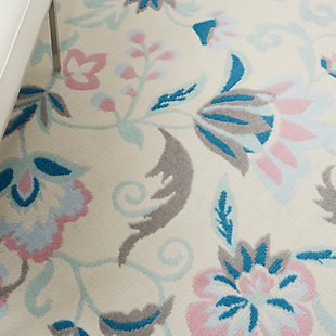 Smart and sophisticated, the jubilant collection presents contemporary rugs with fresh new looks and modern color palettes. Beautifully appealing in pastel shades of pink, blue, and grey, each rug features a durable low-pile construction from low-maintenance, easy-care fibers that will blend perfectly into any casual boho setting. A botanical fantasy of flowers tumbles over the slender borders of this charming rug from the jubilant collection. A gentle palette of blue, pink, and ivory plays out on low-pile easy-care fibers, for a casual charm that brightens any space in the home.Easy-care fibers | Low shedding | Indoor only