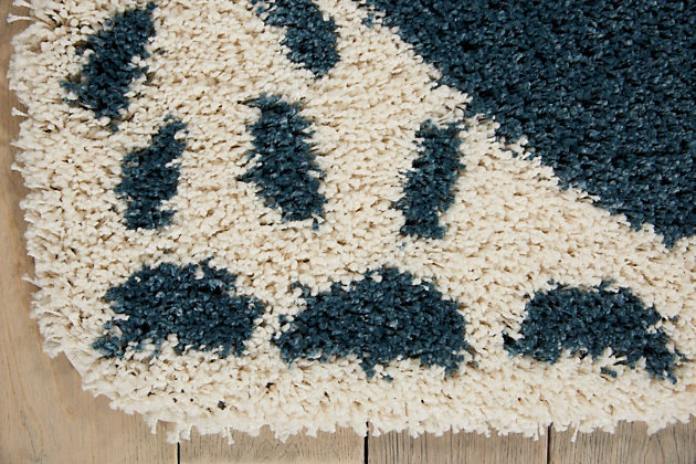 Wonderfully whimsical, the hudson collection of area rugs from nourison is expertly power loomed to bear up beautifully in areas that get lots of action. With its enchanting designs, engaging color palettes, and marvelous textures, hudson will charm and delight for years to come. This hudson area rug from nourison brings a warm, whimsical feel to your home, with a friendly bear peering up at you in deep navy blue and white shag. Each rug is expertly power loomed to bear up beautifully in areas that get lots of action.Serged edges | Low shedding | Indoor only | Vacuum regularly. Clean spills immediately by blotting with a clean damp sponge or cloth. Professional cleaning recommended.