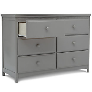 Classic styling and pearl detailing give the Emerson 6 Drawer Dresser by Delta Children a timeless quality. Equipped with six sliding drawers that feature safety stops to prevent the drawers from falling out, this dresser offers a wealth of storage space. Its beautiful finish will never go out of style, while its sturdy wood construction makes it as durable as it is attractive. Round drawer pulls provide a charming finishing touch. A great piece for the nursery, your kid's bedroom or your master bedroom, The Emerson is the smart choice for storage in any space. The Emerson 6 Drawer Dresser is part of the Emerson nursery collection. Pair with the Emerson 4-in-1 Convertible Crib for a coordinated look. Coordinating collection pieces each sold separately. All Delta Children dressers and chests meet the requirements of ASTM F2057, the voluntary industry tip over standard for dressers. For your children's safety, only purchase dressers that comply with this standard. For additional security, Delta strongly recommends that all dressers in your home be anchored; all Delta dressers include a wall anchor. To learn how to properly secure your dresser, please see the product assembly instructions or visit our website.6 large drawers offer plenty of storage space | Drawers feature metal drawer guides with safety stops for years of worry-free use | Strong & sturdy wood construction | Engineered and tested to meet astm furniture safety standards; tested for lead and other toxic elements to meet or exceed astm safety standards; includes tipover restraint | Assembled dimensions: 47.50" w x 20.25" d x 34" h | Assembly required | For any questions regarding delta children products, please contact consumersupport@deltachildren.com monday to friday, 8:30 a.m. To 6 p.m. (est)