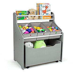 Give your little one a separate place to keep all his/her things organized with the Humble Crew Camden 3-in-1 Toy Storage Organizer with Rollout Toy Chest. Featuring three fabric storage bins that provide additional organizational and storage space, your little one can take the collapsible bins in this kid’s storage unit out and replace them during cleanup. Top ledge is the perfect space to display books or any other decorative item. Spacious bottom removable compartment has casters for smooth rollout movement. Crafted from durable wood, this toy storage unit will continue to serve efficiently for many years. It provides easy-to-see and easy-to-access open storage for your convenience. A great toy box alternative; helping keep your little one’s room clean and organized while at the same time teaching color identification, sorting and cognitive skills. Perfect organizational solution for bedrooms, nurseries, playrooms and family rooms.Features top ledge for small books, 3 collapsible fabric toy storage bins and a large rolling toy box | Removable toy storage bins for playtime and easy clean up | Overall: 25 x 15 x 30h. Rolling toy box: 22 x 13.75 x 12.75" . Fabric bins 7.75" x 11.25" x 5"h. Top shelf: 5" width | Sized just right for toddlers and preschool aged children.