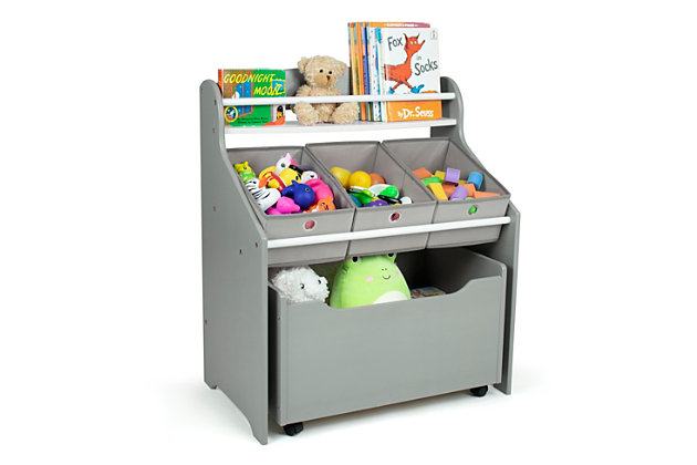 Give your little one a separate place to keep all his/her things organized with the Humble Crew Camden 3-in-1 Toy Storage Organizer with Rollout Toy Chest. Featuring three fabric storage bins that provide additional organizational and storage space, your little one can take the collapsible bins in this kid’s storage unit out and replace them during cleanup. Top ledge is the perfect space to display books or any other decorative item. Spacious bottom removable compartment has casters for smooth rollout movement. Crafted from durable wood, this toy storage unit will continue to serve efficiently for many years. It provides easy-to-see and easy-to-access open storage for your convenience. A great toy box alternative; helping keep your little one’s room clean and organized while at the same time teaching color identification, sorting and cognitive skills. Perfect organizational solution for bedrooms, nurseries, playrooms and family rooms.Features top ledge for small books, 3 collapsible fabric toy storage bins and a large rolling toy box | Removable toy storage bins for playtime and easy clean up | Overall: 25 x 15 x 30h. Rolling toy box: 22 x 13.75 x 12.75" . Fabric bins 7.75" x 11.25" x 5"h. Top shelf: 5" width | Sized just right for toddlers and preschool aged children.