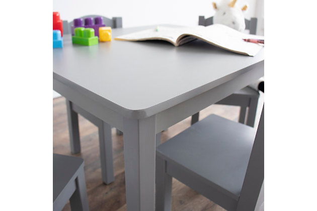 Sized just right for growing kids, the Humble Crew Kids Table and Chair set will host tons of coloring and art projects, snack times and creative play over the years. Modern kids furniture set includes a grey square kids table and four gray chairs that will provide years of creative fun. Durable sturdy engineered wood construction. Easy to assemble. Table and chairs are designed specifically for your little one and is ideal for children aged 3 and up. Product dimensions: Table - 26" x 22". Chairs - 10" x 10" x 22"H. Seat height - 10".Great for eating, reading books, coloring, arts and crafts, playing board games, and more | Sturdy engineered wood construction. Easy to assemble. Product sizing table: 26 in. W x 22 in. D x 19 in. H, chairs: 10 in. W x 10 in. D x 22 in. H, seat height: 10 in. H | Neutral design allows this product to fit into any setting. | Ideal for your toddler's bedroom, playroom, or the living room