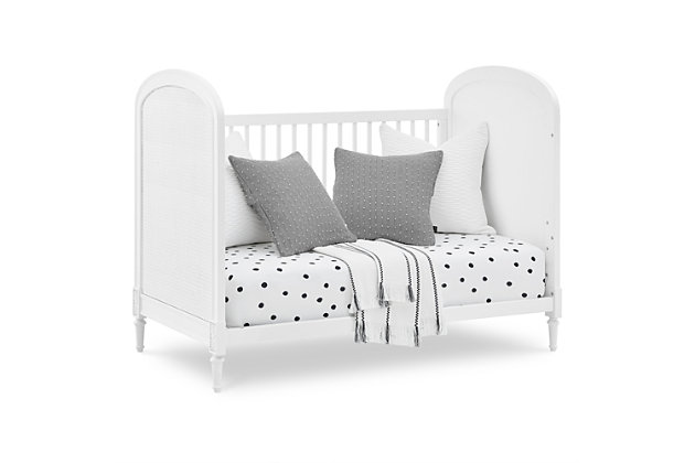Timeless style, quality materials and a touch of texture make the Madeline 4-in-1 convertible crib a fashionable, functional addition to any nursery. Woven cane detailing on both end panels contrasts beautifully with the solid wood frame, while rosette carvings and fluted legs elevate the design. An included conversion kit lets you turn this baby crib into a toddler bed, daybed and sofa as your child grows. To complete your nursery, pair it with the coordinating Madeline 4-drawer dresser with changing top.Made of wood, engineered wood and paper caning | Wood frame with white finish | Converts from crib to toddler bed, sofa and daybed (conversion rail included) | Pair with madeline 4-drawer dresser with changing top (sold separately) | Jpma certified; tested above and beyond industry standards | For any questions regarding delta children products, please contact consumersupport@deltachildren.com monday to friday, 8:30 a.m. To 6 p.m. (est) | Assembly required
