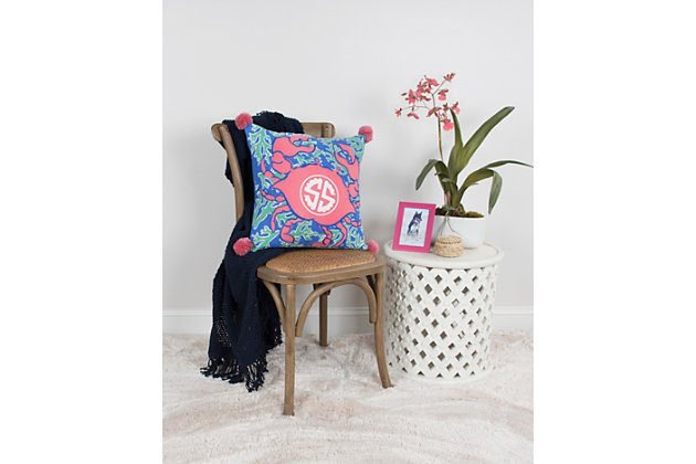 This pillow features a whimsically crafted crab wearing the Simply Southern logo on this shell and outlined in classic blue embroidered stitchery. Four corner poms are featured in this pillows four corners. Knife edged, this pillow features a coordinating solid cotton back with a hidden zipper closure.Printed knife edge pillow | Embroidered crab outline | Simply southern logo on crab's back | Solid coordinating back with hidden zipper closure | Spot clean only