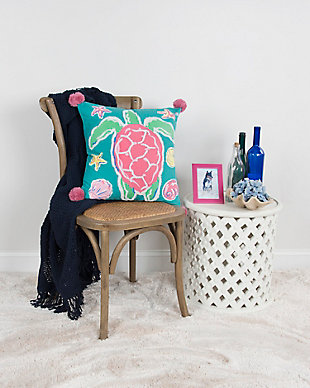 Whimsically crafted, this pillow features print with accent embroidery, some of it textural giving this pillow a soft cotton dimensioning. Four poms don the corners of this knife edged pillow. The solid coordinating cotton back features a hidden zipper closure for ease of fill.Printed knife edge pillow | Embroidered accents | Poms on each corner | Coordinating solid back with hidden zipper closure | Spot clean only