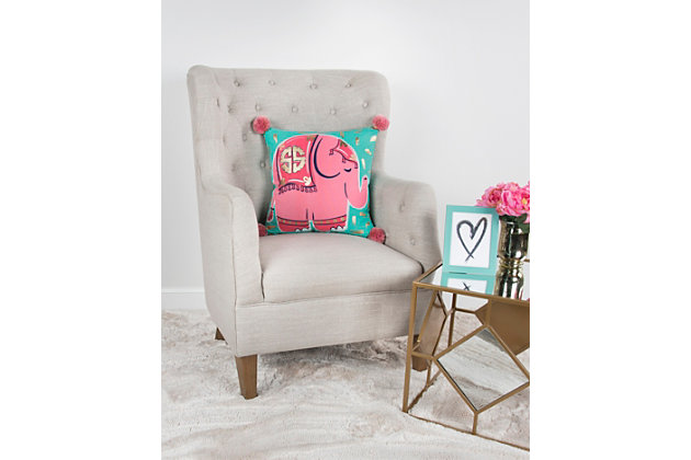 Whimsically crafted, this printed elephant on a teal background with gold foil overprint gives this pillow a grand dose of cuteness. Four pink poms don the four corners of this pillow. Knife edged, this pillow features a coordinating solid cotton back with a hidden zipper closure.Printed knife edge pillow | Poms on each of the four corners | Gold foil overprint | Coordinating solid back with hidden zipper closure | Spot clean only