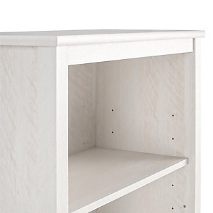 It’s what every little bookworm dreams of – a kids’ bookcase to house all their favorite picture books and bedtime stories easily within their short reach – the Little Seeds Monarch Hill Poppy Kids’ White Bookcase! Made of laminated MDF and particleboard with an Ivory Oak woodgrain finish, this adorable kids’ bookcase features three open shelves for storing all their favorite books and toys, two of which are adjustable to your preferred height. The two sliding door fronts on the bookcase’s bottom cubby give your little one a bonus storage space for their secret treasures, and we’ve included two different sets of knobs so you can customize the kids’ bookcase to your personal style. The Little Seeds Monarch Hill Poppy Kids’ White Bookcase will not only be a charming addition to your kids’ bedroom décor, it just might be the very thing to catalyze your little scholar’s lifelong love of reading. For added peace of mind, the kids’ bookcase meets or exceeds the CPSIA Juvenile testing requirements and comes with a wall anchor kit to ensure your child’s safety. Little Seeds not only creates this and many more on trend kids’ furniture pieces, we also partner with the National Wildlife Federation’s Garden for Wildlife program to help save the Monarch butterfly.Made of laminated mdf and particleboard | Includes 2 knob choices to customize the cubby’s sliding doors to your personal style | Each shelf and the lower concealed cubby can hold up to 35 lbs. Each.  a wall anchor kit is included to ensure your child's safety | 1 year limited warranty.  assembled dimensions: 54.92h x 27.44w x 12.76d