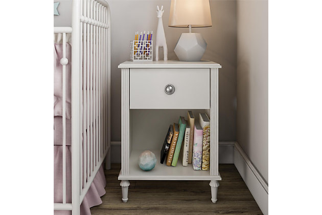 Your little one has most certainly outgrown her childhood bedroom and has been scouring the internet for teen bedroom ideas to transform her space from a kid’s playroom to her own sophisticated sanctuary space free from grown-up demands and rules. Let the Little Seeds Rowan Valley Arden White Kids’ Nightstand be an elegant addition to your child’s new grown up space. Made of laminated MDF and particle board with a chic white finish, an open cubby space for extra storage, and a posh silver ring drawer pull, this beautiful white kids’ nightstand will be a perfect piece for your child’s bedside storage needs. The Little Seeds Rowan Valley Arden White Kids’ Nightstand’s drawer features durable metal drawer slides with built-in stops, and the kids’ nightstand also meets or exceeds the CPSIA Juvenile testing requirements while also including a wall anchor kit to ensure your child’s safety. Little Seeds not only creates this and many more on trend baby and kids’ furniture pieces, we also partner with the National Wildlife Federation’s Garden for Wildlife program to help save the Monarch butterfly.Made of laminated mdf and particleboard with white finish | 1 drawer with durable metal slides and built in stops for safety | Drawer weight limit: 15 lbs., top weight limit: 40 lbs., cubby space weight limit: 40 lbs., 1 year limited warranty | Assembled dimensions: 26.93” h x 19.69” w x 15.16” d