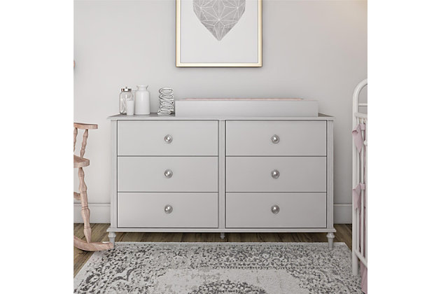 Your precious little one is on the way and you’ve been scouring the internet for baby nursery ideas to transform your spare room into a soft, sophisticated space for both you and your new baby.  Let the Little Seeds Rowan Valley Arden 6 Drawer Grey Changing Dresser be an elegant as well as practical addition to your baby’s new space.  Made of laminated MDF and particle board with a chic dove grey finish and posh silvertone ring drawer pulls, this beautiful dresser-changer combo will be a perfect storage piece for your baby’s clothes and diaper changing needs. The Little Seeds Rowan Valley Arden 6 Drawer Gray Changing Dresser drawers feature durable metal drawer slides with built-in stops for safety, and the change table topper fits a standard size changing pad (not included). Once your little one outgrows the changing table, simply remove the topper to convert to a kids’ dresser.  The dresser-changer combo meets or exceeds the CPSIA Juvenile testing requirements and includes a wall anchor kit to ensure your child’s safety. Little Seeds not only creates on trend baby and kids’ furniture pieces, we also partner with the National Wildlife Federation’s Garden for Wildlife program to help save the Monarch butterfly. Includes 6-drawer dresser and diaper change topper | Made of laminated MDF and particleboard with dove grey finish | Change table topper fits a standard size changing pad (not included) | Dresser features 6 drawers with durable metal slides and built in stops for safety | Dresser-changer combo meets or exceeds the CPSIA Juvenile testing requirements | Remove the change table topper when your child outgrows it to convert to a kids’ dresser | Dresser top weight limit 75 lbs.; drawer weight limit 35 lbs. each; change table topper weight limit 30 lbs. | 1-year limited warranty | Assembly required | Ships in 2 boxes