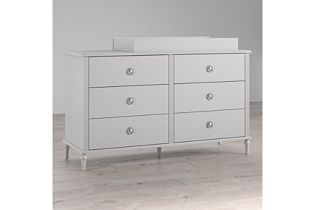Your precious little one is on the way and you’ve been scouring the internet for baby nursery ideas to transform your spare room into a soft, sophisticated space for both you and your new baby.  Let the Little Seeds Rowan Valley Arden 6 Drawer Grey Changing Dresser be an elegant as well as practical addition to your baby’s new space.  Made of laminated MDF and particle board with a chic dove grey finish and posh silvertone ring drawer pulls, this beautiful dresser-changer combo will be a perfect storage piece for your baby’s clothes and diaper changing needs. The Little Seeds Rowan Valley Arden 6 Drawer Gray Changing Dresser drawers feature durable metal drawer slides with built-in stops for safety, and the change table topper fits a standard size changing pad (not included). Once your little one outgrows the changing table, simply remove the topper to convert to a kids’ dresser.  The dresser-changer combo meets or exceeds the CPSIA Juvenile testing requirements and includes a wall anchor kit to ensure your child’s safety. Little Seeds not only creates on trend baby and kids’ furniture pieces, we also partner with the National Wildlife Federation’s Garden for Wildlife program to help save the Monarch butterfly. Includes 6-drawer dresser and diaper change topper | Made of laminated MDF and particleboard with dove grey finish | Change table topper fits a standard size changing pad (not included) | Dresser features 6 drawers with durable metal slides and built in stops for safety | Dresser-changer combo meets or exceeds the CPSIA Juvenile testing requirements | Remove the change table topper when your child outgrows it to convert to a kids’ dresser | Dresser top weight limit 75 lbs.; drawer weight limit 35 lbs. each; change table topper weight limit 30 lbs. | 1-year limited warranty | Assembly required | Ships in 2 boxes