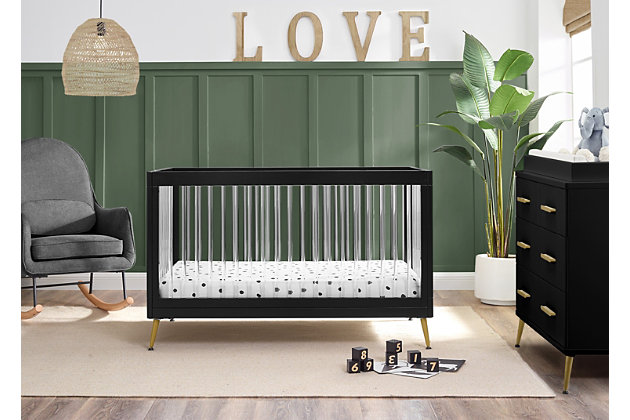 The Sloane 4-in-1 convertible crib is fashionable and functional, adjusting to your changing needs over time. In neutral colors that match just about any room decor, it transforms into a toddler bed, sofa and daybed as your child grows. Splayed bronze-tone feet add a polished look, and clear acrylic spindles create an open, airy feel. To complete the nursery, pair this crib with the Sloane 4-drawer dresser with changing top.Wood frame with black finish | Clear acrylic spindles | Splayed bronze-tone feet | Converts from crib to toddler bed, sofa and daybed (conversion rail included) | Pair with sloane 4-drawer dresser (sold separately) | Jpma certified; tested above and beyond industry standards