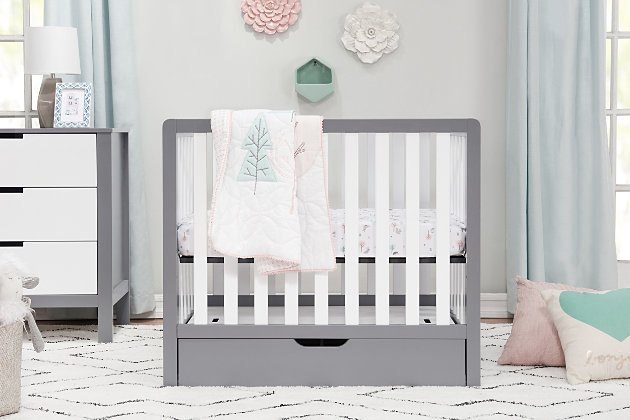 The Colby convertible mini crib with trundle drawer merges contemporary flair, durability and reliability. Mirroring the modern design of the Colby 4-in-1 convertible crib with trundle drawer, the Colby mini crib features clean lines and lifetime functionality in a space-efficient design. Four mattress levels allow you to adjust the mattress height as your baby begins to sit and stand. Beyond the nursery years, the Colby mini crib conveniently becomes a beautiful mini toddler bed, daybed and -size bed. It coordinates with the Colby 3-drawer and 6-drawer dressers for a beautiy equipped ensemble.Made of sustainable wood and engineered wood | Finished in a non-toxic multi-step painting process; lead and phthalate safe | Exceeds astm and cpsc safety standards | Greenguard gold certified; tested for over 10,000 chemicals | 4 adjustable mattress positions to accommodate your growing baby | Fits standard size crib mattress (sold separately) | Easily converts to mini toddler bed, day bed and -size bed | Mini toddler bed conversion kit (m20399) and -size bed conversion kit (m5789) sold separately | Assembly required