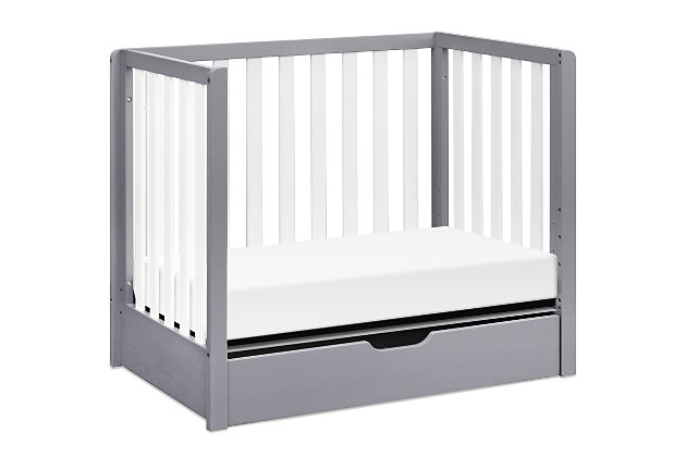 The Colby convertible mini crib with trundle drawer merges contemporary flair, durability and reliability. Mirroring the modern design of the Colby 4-in-1 convertible crib with trundle drawer, the Colby mini crib features clean lines and lifetime functionality in a space-efficient design. Four mattress levels allow you to adjust the mattress height as your baby begins to sit and stand. Beyond the nursery years, the Colby mini crib conveniently becomes a beautiful mini toddler bed, daybed and -size bed. It coordinates with the Colby 3-drawer and 6-drawer dressers for a beautiy equipped ensemble.Made of sustainable wood and engineered wood | Finished in a non-toxic multi-step painting process; lead and phthalate safe | Exceeds astm and cpsc safety standards | Greenguard gold certified; tested for over 10,000 chemicals | 4 adjustable mattress positions to accommodate your growing baby | Fits standard size crib mattress (sold separately) | Easily converts to mini toddler bed, day bed and -size bed | Mini toddler bed conversion kit (m20399) and -size bed conversion kit (m5789) sold separately | Assembly required