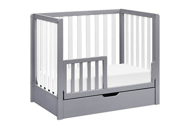 The Colby convertible mini crib with trundle drawer merges contemporary flair, durability and reliability. Mirroring the modern design of the Colby 4-in-1 convertible crib with trundle drawer, the Colby mini crib features clean lines and lifetime functionality in a space-efficient design. Four mattress levels allow you to adjust the mattress height as your baby begins to sit and stand. Beyond the nursery years, the Colby mini crib conveniently becomes a beautiful mini toddler bed, daybed and twin-size bed. It coordinates with the Colby 3-drawer and 6-drawer dressers for a beautifully equipped ensemble.Made of sustainable wood and engineered wood | Finished in a non-toxic multi-step painting process; lead and phthalate safe | Exceeds astm and cpsc safety standards | Greenguard gold certified; tested for over 10,000 chemicals | 4 adjustable mattress positions to accommodate your growing baby | Fits standard size crib mattress (sold separately) | Easily converts to mini toddler bed, day bed and twin-size bed | Mini toddler bed conversion kit (m20399) and twin-size bed conversion kit (m5789) sold separately | Assembly required