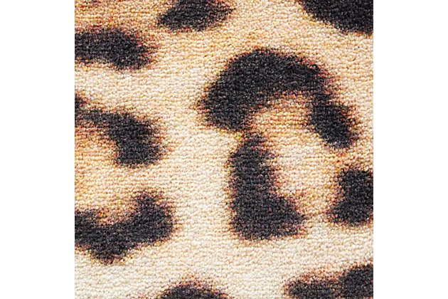 Take a walk on the wild side with the animal print motif of Mohawk Homes Cheetah Spots Area Rug in Neutral. When it comes to color, the sky is no longer the limit with the infinite possibilities of Mohawk Homes revolutionary Prismatic Collection. Thoughtfully crafted in the U.S.A. in small batches utilizing Mohawk Homes exclusive Precision Dye Injected Printer, the Prismatic Collection is redefining printed rugs, literally one original design at a time. Designed on a plush EverStrand woven base, each style in this collection features superior strength stain resistance and a cozy soft touch. Consciously created with EverStrand yarn, Mohawk Homes exclusive premium recycled polyester produced from post-consumer plastic water bottles, this collection offers environmentally friendly options that are as easy on the eyes as they are the world around us.Kids/Tween Collection | Printed Area Rug | Made in the USA | 100% EverStrand