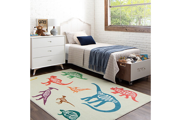 Teach your little one some dino vocab with the whimsical multicolored design of Mohawk Homes Dinosaurs Area Rug! When it comes to color, the sky is no longer the limit with the infinite possibilities of Mohawk Homes revolutionary Prismatic Collection. Thoughtfully crafted in the U.S.A. in small batches utilizing Mohawk Homes exclusive Precision Dye Injected Printer, the Prismatic Collection is redefining printed rugs, literally one original design at a time. Designed on a plush EverStrand woven base, each style in this collection features superior strength stain resistance and a cozy soft touch. Consciously created with EverStrand yarn, Mohawk Homes exclusive premium recycled polyester produced from post-consumer plastic water bottles, this collection offers environmentally friendly options that are as easy on the eyes as they are the world around us.Kids/Tween Collection | Printed Area Rug | Made in the USA | 100% EverStrand
