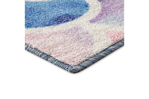 A sweet scalloped motif features watercolor inspired hues of pink, blue, teal and purple in the contemporary style of Mohawk Homes Mermaid Scales Area Rug. When it comes to color, the sky is no longer the limit with the infinite possibilities of Mohawk Homes revolutionary Prismatic Collection. Thoughtfully crafted in the U.S.A. in small batches utilizing Mohawk Homes exclusive Precision Dye Injected Printer, the Prismatic Collection is redefining printed rugs, literally one original design at a time. Designed on a plush EverStrand woven base, each style in this collection features superior strength stain resistance and a cozy soft touch. Consciously created with EverStrand yarn, Mohawk Homes exclusive premium recycled polyester produced from post-consumer plastic water bottles, this collection offers environmentally friendly options that are as easy on the eyes as they are the world around us.Kids/Tween Collection | Printed Area Rug | Made in the USA | 100% EverStrand