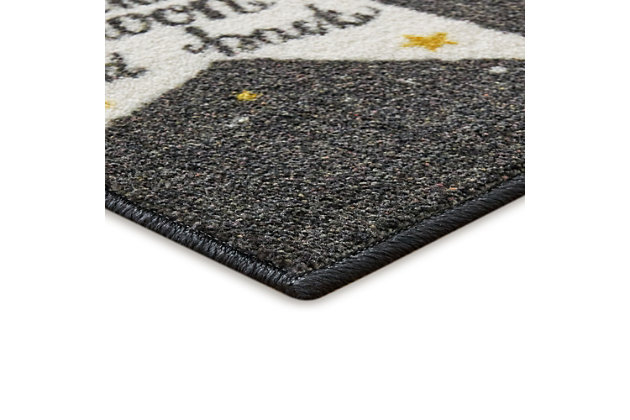 A contemporary star motif says it all in the modern design of Mohawk Homes To the Moon Area Rug in Black and White. When it comes to color, the sky is no longer the limit with the infinite possibilities of Mohawk Homes revolutionary Prismatic Collection. Thoughtfully crafted in the U.S.A. in small batches utilizing Mohawk Homes exclusive Precision Dye Injected Printer, the Prismatic Collection is redefining printed rugs, literally one original design at a time. Designed on a plush EverStrand woven base, each style in this collection features superior strength stain resistance and a cozy soft touch. Consciously created with EverStrand yarn, Mohawk Homes exclusive premium recycled polyester produced from post-consumer plastic water bottles, this collection offers environmentally friendly options that are as easy on the eyes as they are the world around us.Kids/Tween Collection | Printed Area Rug | Made in the USA | 100% EverStrand