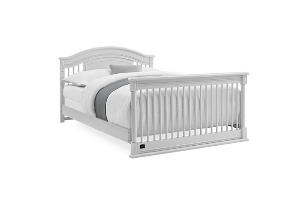 Elegant spindles, gorgeous molding and fluted legs with intricate carvings give the Juliette 6-in-1 Convertible Crib by Simmons Kids a sophisticated look. This crib’s grow-with-me design features three adjustable height levels that allow the crib to be lowered as your child grows, plus it converts from a crib, to a toddler bed, sofa, daybed, size bed with headboard or size bed with headboard and footboard. The only bed your little one will ever need, this versatile crib will take you from the nursery to high school, and all the years in between. Toddler Guardrail included; Size Bed Rails sold separately. To complete your nursery, pair with the coordinating Juliette 6 Drawer Dresser with Changing Top. Producing the finest furniture for over 80 years, Simmons Kids has always been committed to the safety of every family. All Simmons Kids cribs are JPMA certified, are rigorously tested to meet or exceed all industry safety standards.Safe option for your baby: this crib is jpma certified to meet or exceed all safety standards set by the cpsc & astm; we know chemicals have no place in your nursery, so we use a non-toxic multi-step painting process that is lead and phthalate safe | 6-in-1 convertible crib: crib converts to toddler bed, daybed, sofa, a size bed with headboard and footboard and size bed with headboard only; daybed/sofa/toddler guardrail kit included ( size wood bed rails #0050 or size metal bed frame #0040 sold separately); available in moonstruck grey or bianca white | Adjustable height: adjustable height mattress support with 3 convenient positions to grow with your baby | Coordinating items: pair with the juliette 6 drawer dresser with changing top for the perfect baby nursery; uses a standard size crib mattress (sold separately); to ensure the perfect fit pair your crib with a delta children, serta, beautyrest or simmons kids crib mattress | Quality material: made of sustainable woods like new zealand pine wood, poplar wood and tsca compliant engineered wood; tested for lead and other toxic elements to meet or exceed government and astm safety standards | Size: assembled dimensions: 56.75"w x 32.25"d x 46"h; easy assembly
