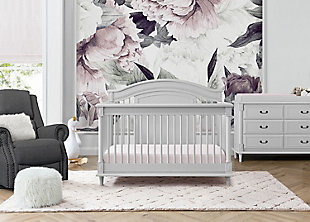Elegant spindles, gorgeous molding and fluted legs with intricate carvings give the Juliette 6-in-1 Convertible Crib by Simmons Kids a sophisticated look. This crib’s grow-with-me design features three adjustable height levels that allow the crib to be lowered as your child grows, plus it converts from a crib, to a toddler bed, sofa, daybed, full size bed with headboard or full size bed with headboard and footboard. The only bed your little one will ever need, this versatile crib will take you from the nursery to high school, and all the years in between. Toddler Guardrail included; Full Size Bed Rails sold separately. To complete your nursery, pair with the coordinating Juliette 6 Drawer Dresser with Changing Top.  Producing the finest furniture for over 80 years, Simmons Kids has always been committed to the safety of every family. All Simmons Kids cribs are JPMA certified, are rigorously tested to meet or exceed all industry safety standards.Safe option for your baby: this crib is jpma certified to meet or exceed all safety standards set by the cpsc & astm; we know chemicals have no place in your nursery, so we use a non-toxic multi-step painting process that is lead and phthalate safe | 6-in-1 convertible crib: crib converts to toddler bed, daybed, sofa, a full size bed with headboard and footboard and full size bed with headboard only; daybed/sofa/toddler guardrail kit included (full size wood bed rails #0050 or full size metal bed frame #0040 sold separately); available in moonstruck grey or bianca white | Adjustable height: adjustable height mattress support with 3 convenient positions to grow with your baby | Coordinating items: pair with the juliette 6 drawer dresser with changing top for the perfect baby nursery; uses a standard size crib mattress (sold separately); to ensure the perfect fit pair your crib with a delta children, serta, beautyrest or simmons kids crib mattress | Quality material: made of sustainable woods like new zealand pine wood, poplar wood and tsca compliant engineered wood; tested for lead and other toxic elements to meet or exceed government and astm safety standards | Size: assembled dimensions: 56.75"w x 32.25"d x 46"h; easy assembly